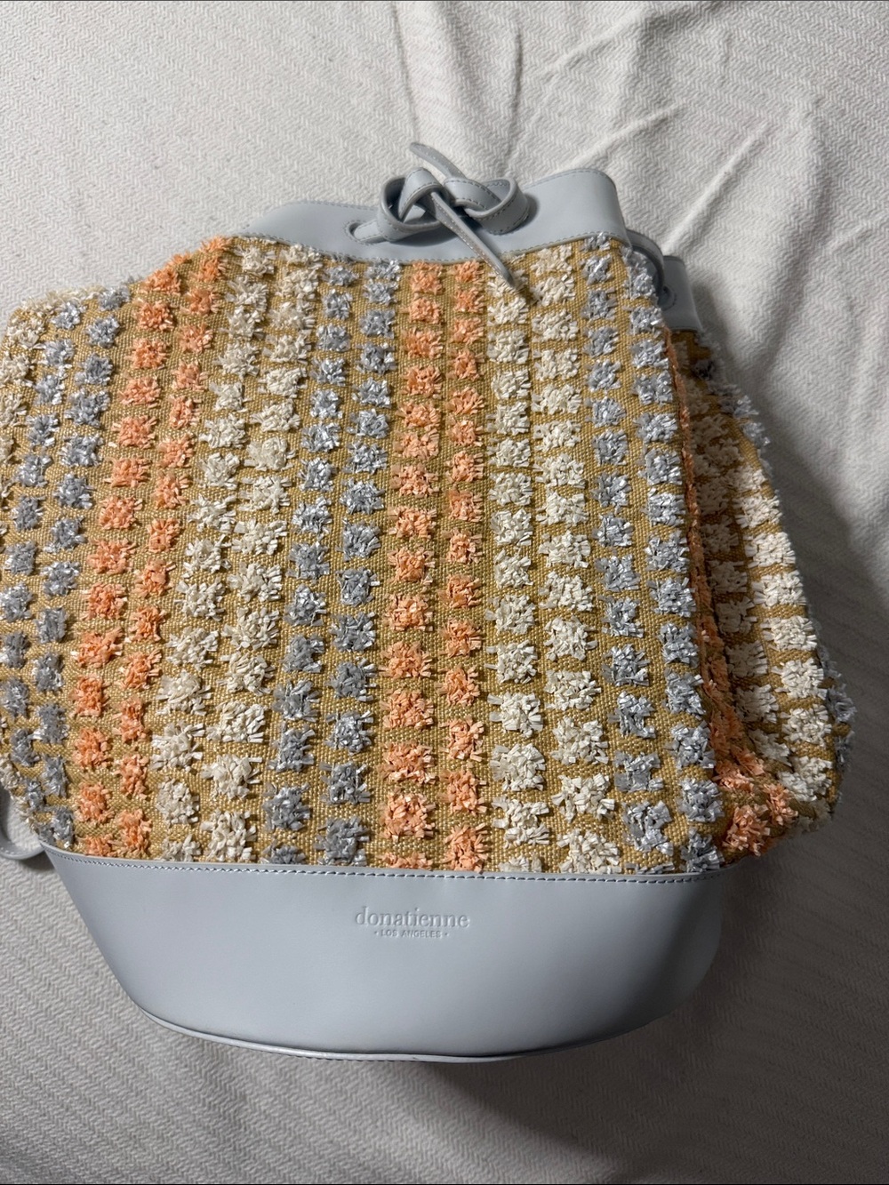 Textured Pastel Stripe Bucket Backpack in Light Blue